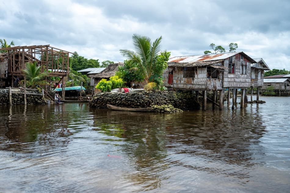 Photo of traditional wood houses in a village.